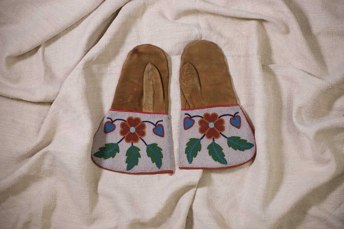 A pair of Native American beaded hide mittens, (1 of 3)