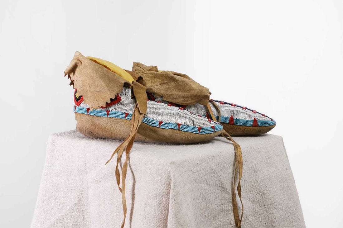 A pair of Native American beaded hide moccasins, (1 of 5)