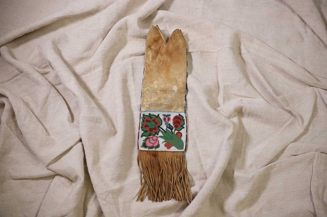 A Native American beaded hide bag, (1 of 5)