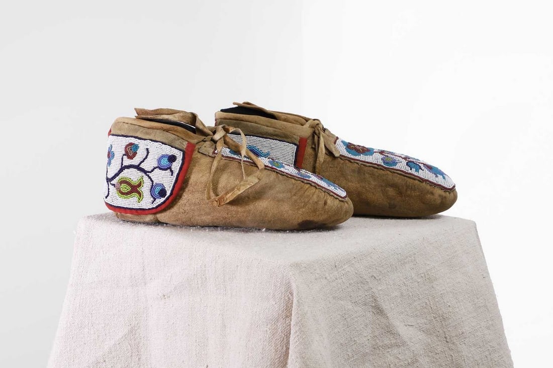 A pair of Native American beaded hide moccasins, (1 of 5)