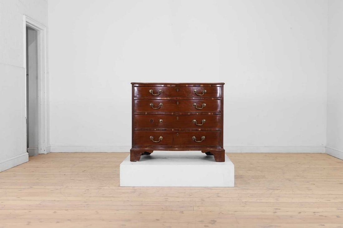 A George III mahogany serpentine chest, (1 of 8)