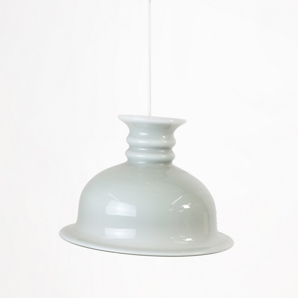A pair of Danish cased glass pendant lights,: A pair of Danish cased glass pendant lights, 1970s, in the manner of Holmegaard, of domed form with a flared rim, in grey 36cm diameter 28cm high (2) Condition Report: With scratches and marks to the