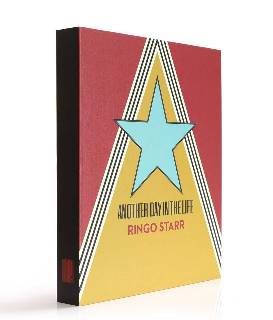 [THE BEATLES] - Ringo Starr SIGNED: ANOTHER DAY IN THE LIFE: [THE BEATLES] - Ringo Starr SIGNED: ANOTHER DAY IN THE LIFE GENESIS DELUXE EDITION Number 229 of 350, out of a total of 2000. Signed by Ringo and with a loosely enclosed limited edition photographic p