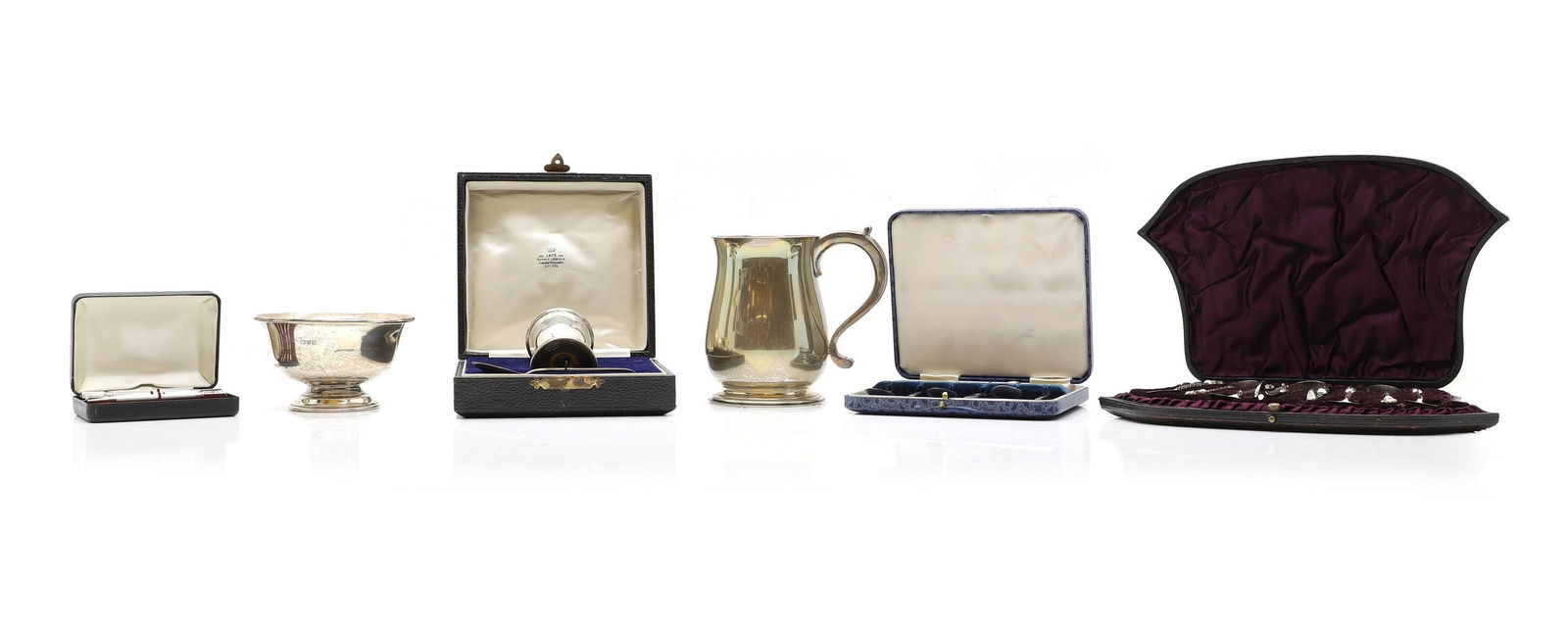 A collection of silver items: A collection of silver items comprising a baluster form tankard, London 1928, two cased sets of teaspoons, cased egg cup and spoon, a small bowl and a cased set of bridge pencils total 21ozt (6) Condi