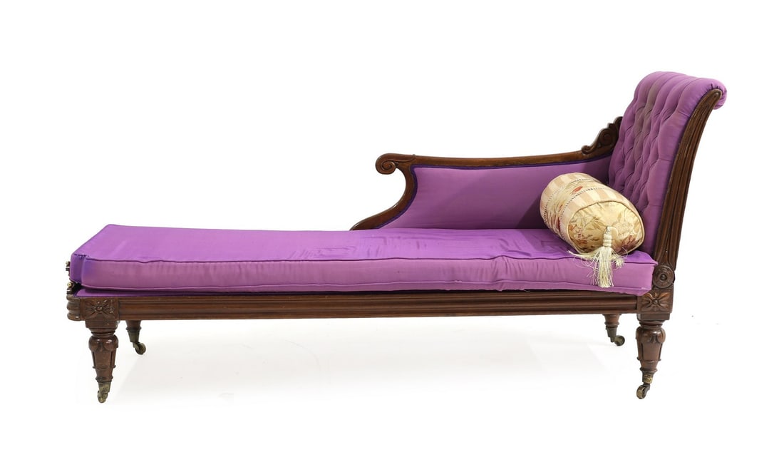 A Victorian chaise longue,: A Victorian chaise longue, with purple upholstery, 183cm wide 62cm deep 88cm high, seat 39cm Condition Report: Used, Loose castors, staining on the covers.