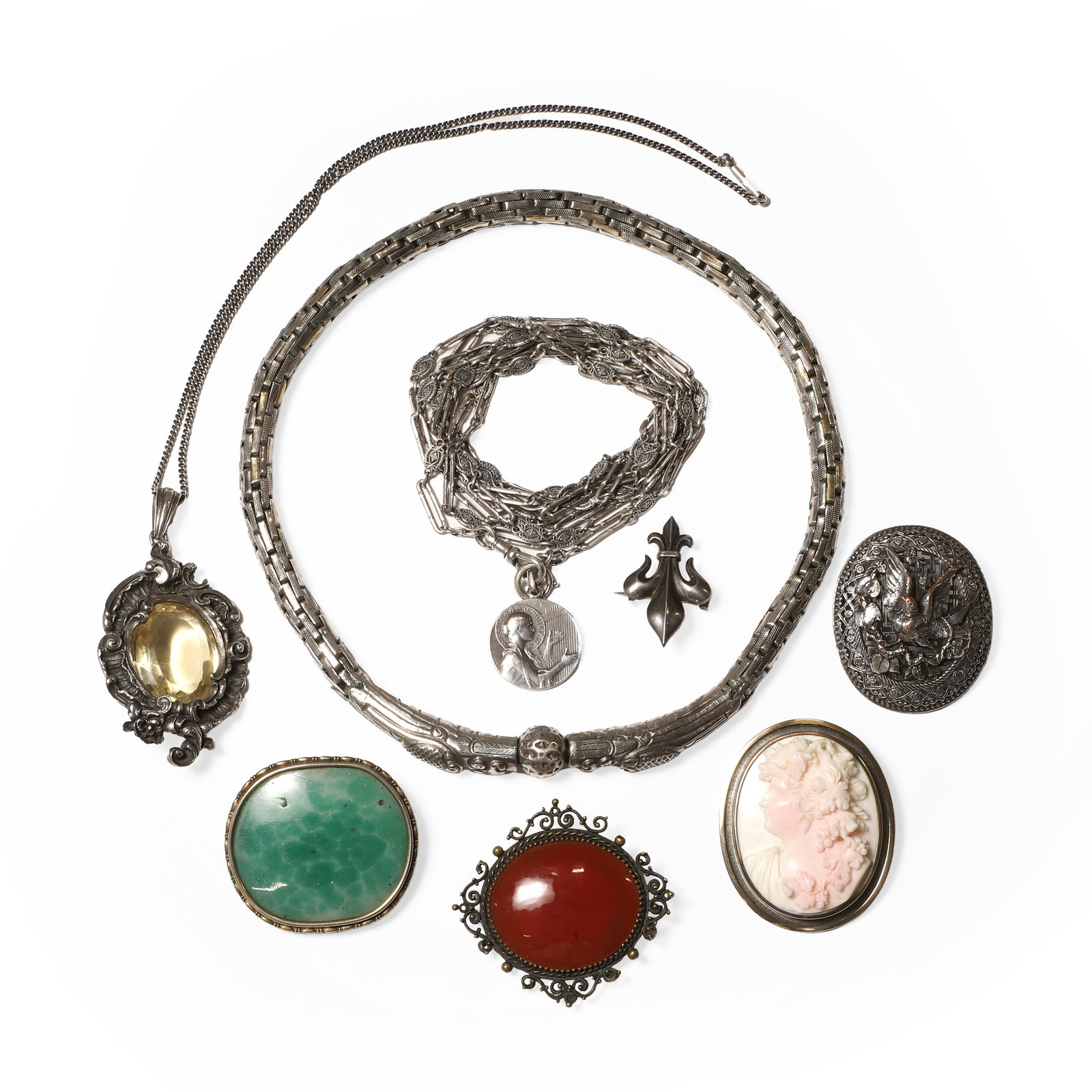 A group of antique and vintage jewels,: A group of antique and vintage jewels, an early 20th century Continental silver citrine pendant, the citrine with an oval Portuguese cut, set to a scrollwork mount, to an articulated tapered bale, 75m