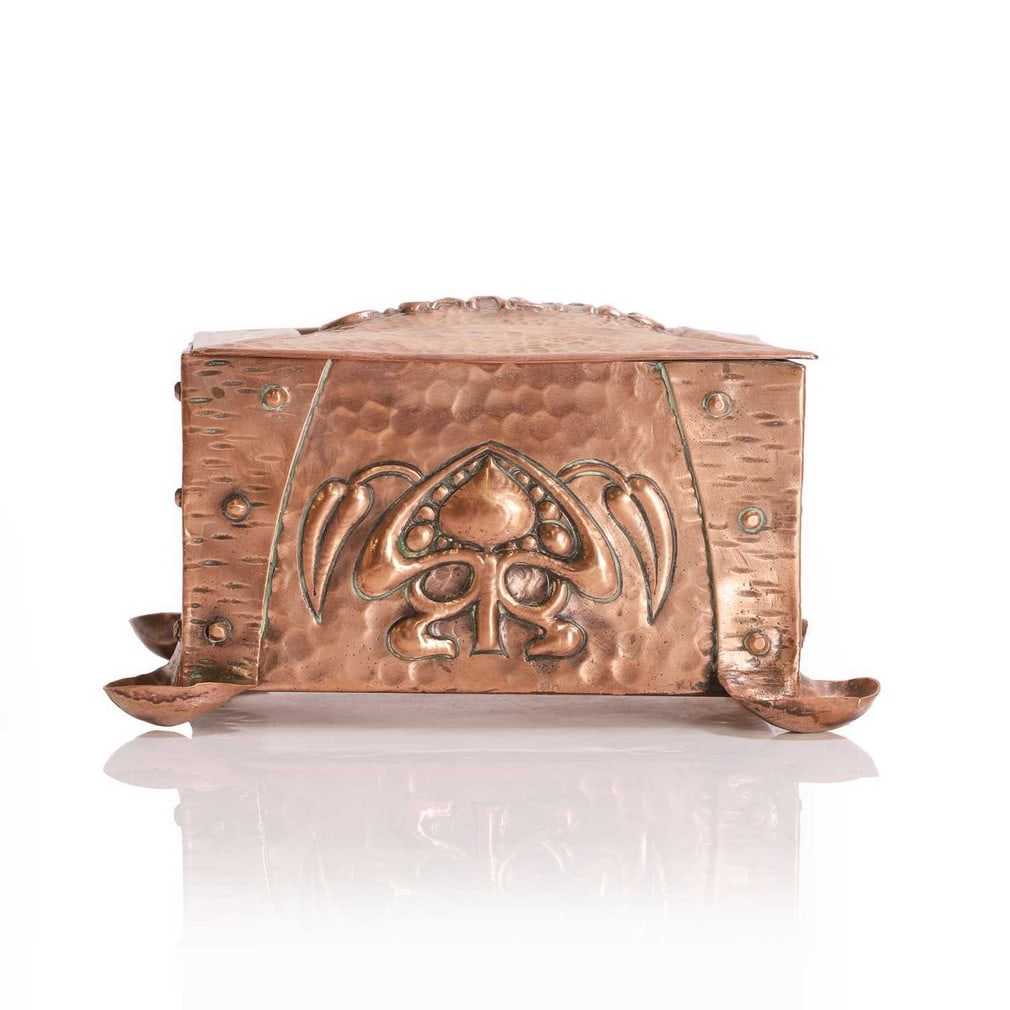 An Arts and Crafts copper cigarette box, (1 of 5)