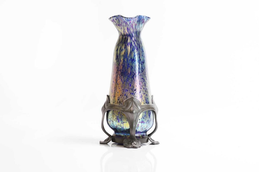 A Loetz cobalt 'Papillon' iridescent glass and pewter-mounted vase,: A Loetz cobalt 'Papillon' iridescent glass and pewter-mounted vase, the mount by Van Houten, the glass of tapering form with a quatrefoil neck, with iridescent spotting to a cobalt-blue ground, stampe