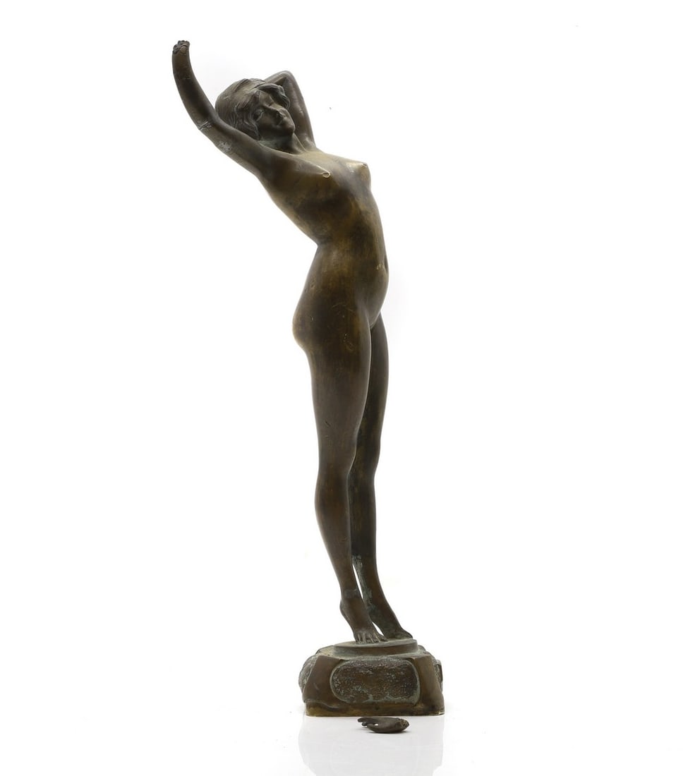 After Paul Philippe: After Paul Philippe 'Le Reveil', a bronze figure of a nude lady, stretching with her arms aloft, 17.5cm high Condition Report: One hand has broken off, but present. Further evidence of some metal fati