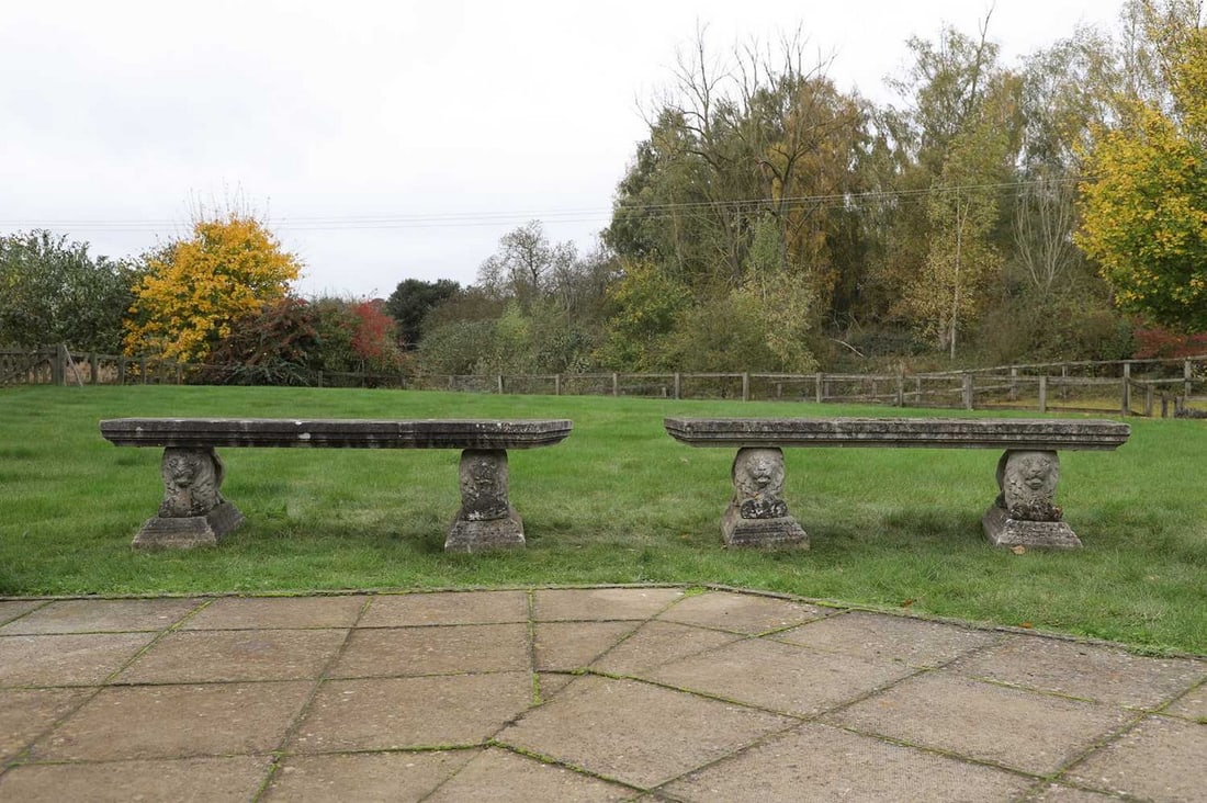 A pair of composition stone garden benches, (1 of 7)