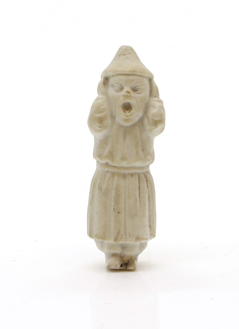 A small pottery figure, (1 of 2)