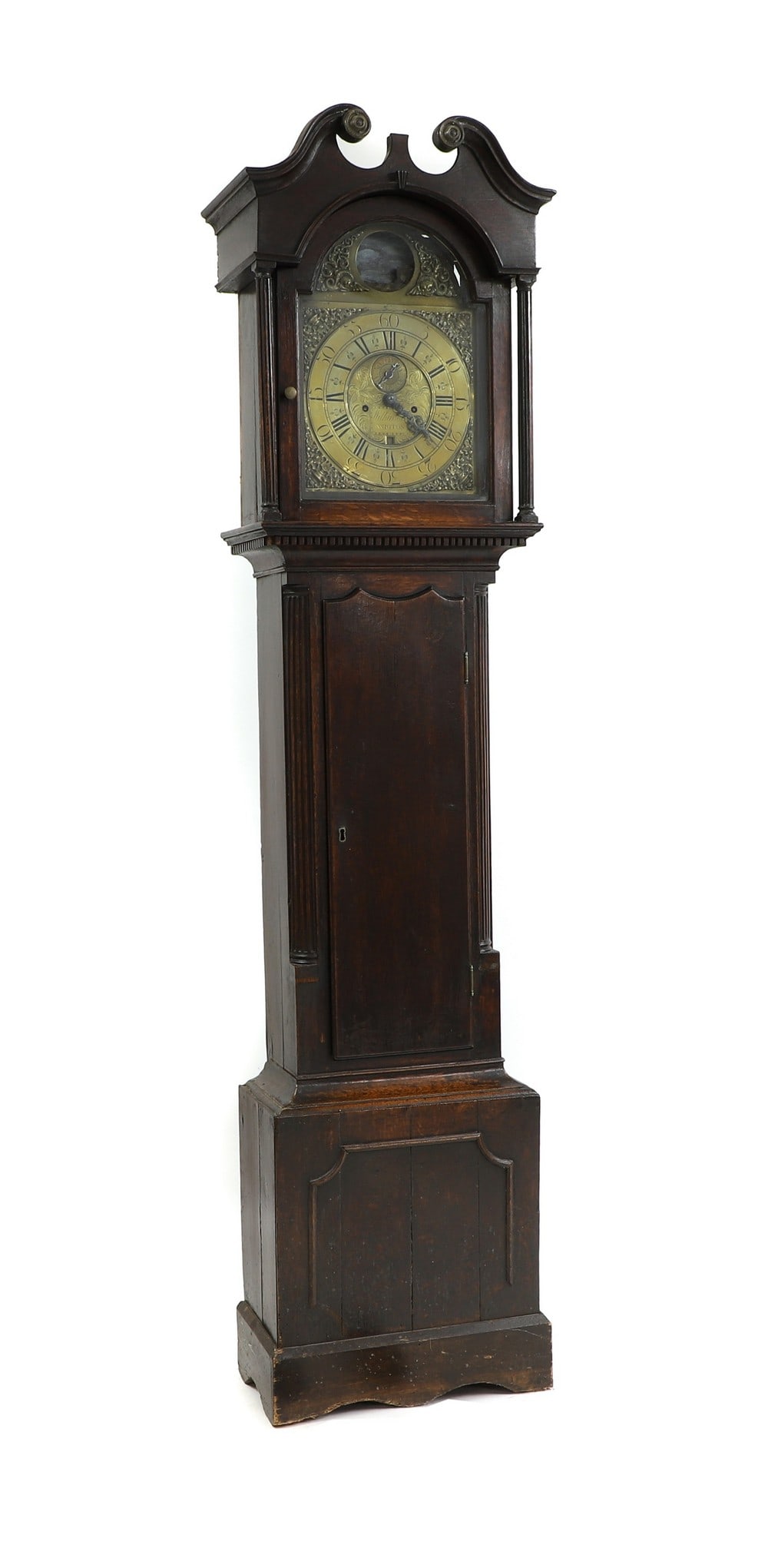 A George III oak longcase clock,: A George III oak longcase clock, by Wilkins Wigton, the brass broken arch dial with ship automaton movement, the shaped trunk door flanked with fluted corners, complete with weights and pendulum, 214c