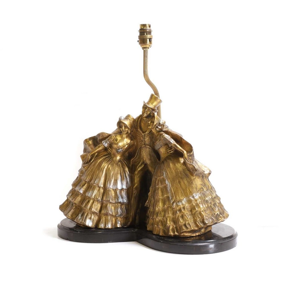 ▲ Fanny Rozet (French, 1881-1958),: ▲ Fanny Rozet (French, 1881-1958), a patinated bronze table lamp, 'Old Time Dance', modelled as a man and two women, on a shaped marble plinth, 42cm wide 22.5cm deep 47.5cm high to top of bulb m