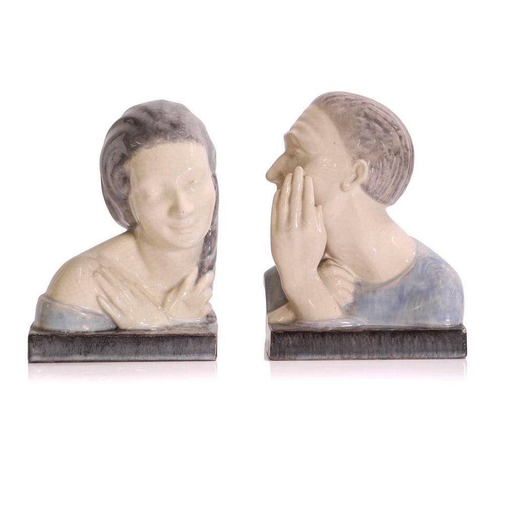 A pair of French Art Deco pottery 'The Secret' bookends, (1 of 5)