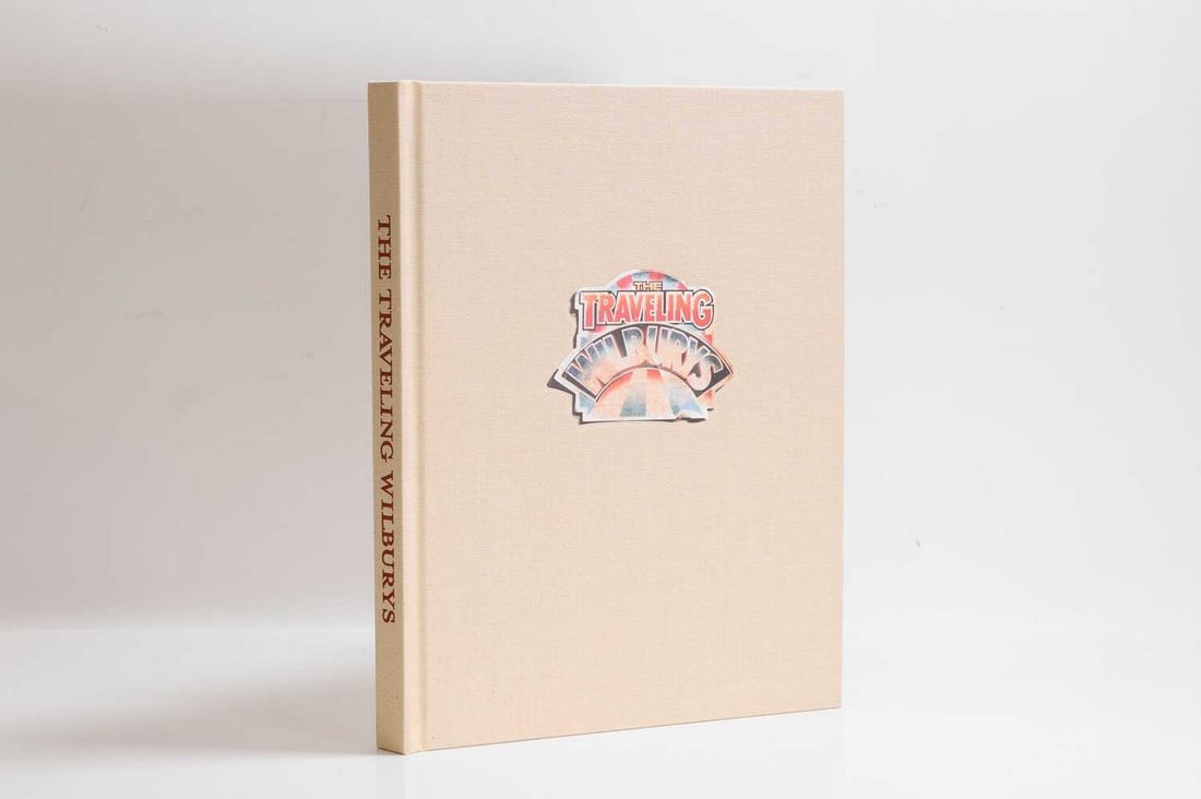 The Traveling Wilburys,: The Traveling Wilburys, published by Genesis Publications in 2009, numbered '920' from the edition of 3000, signed by Jeff Lynne, together with a facsimile lyrics sheet, cloth-bound, housed in a cordu