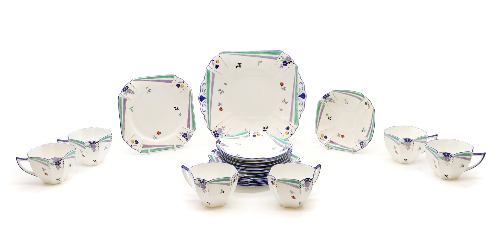 A Shelley 'Flashes and Flower' porcelain tea service,: A Shelley 'Flashes and Flower' porcelain tea service, 1920s, for six settings, of octagonal form, comprising teacups, 6cm high, saucers, 13cm wide, side plates, 16cm wide, and a larger plate, 25cm wid