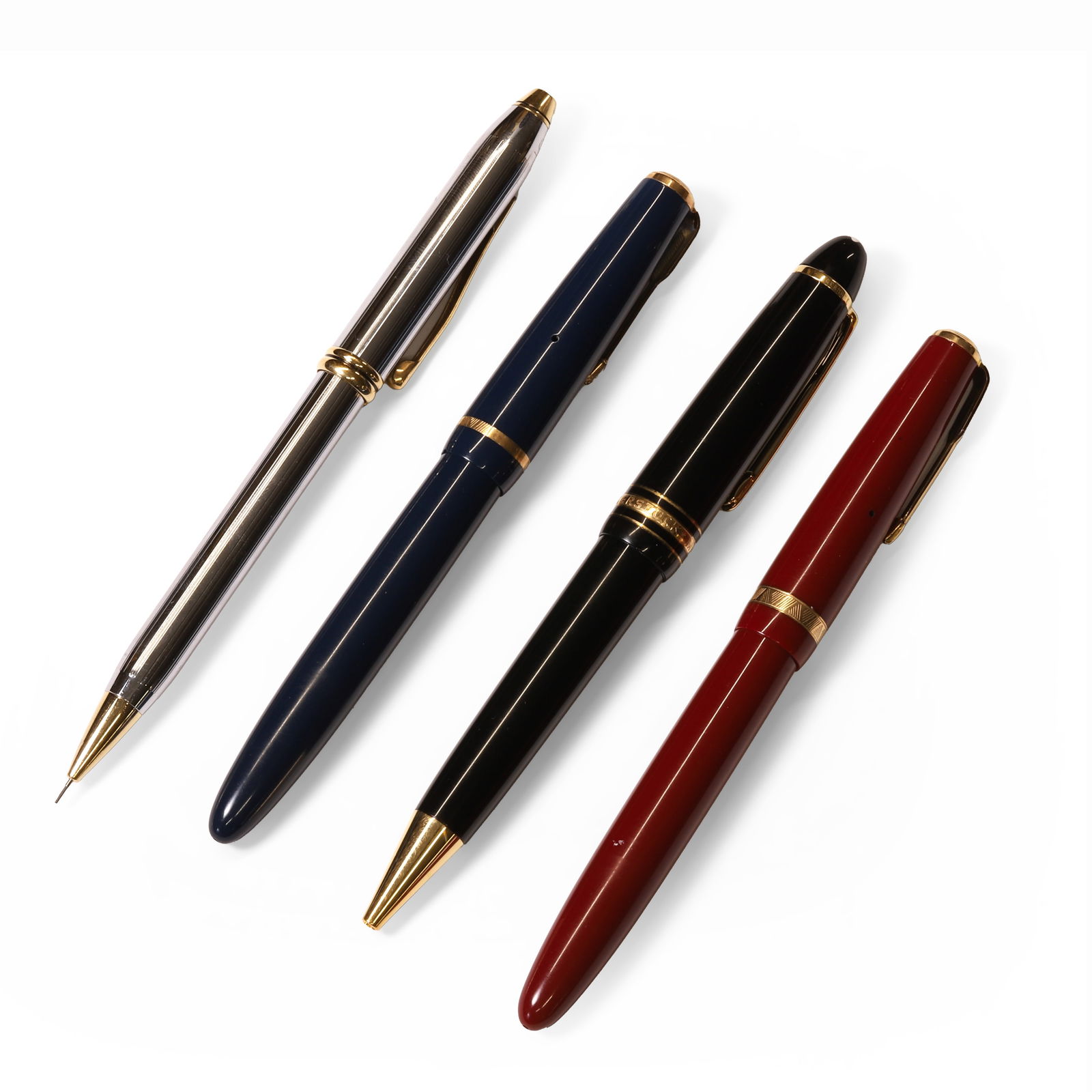 A group of four pens, (1 of 2)