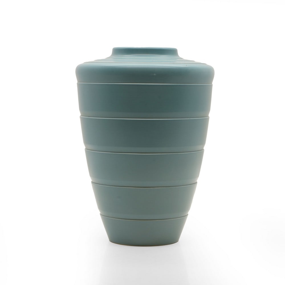 A Keith Murray for Wedgwood pottery vase,: A Keith Murray for Wedgwood pottery vase, c.1930, of tapering stepped form, in a pale green finish, impressed marks, 29cm high Condition Report: In good order, with minor surface wear.