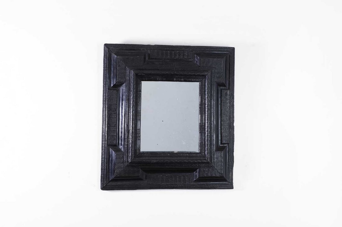 A baroque ebonised wooden mirror, (1 of 7)