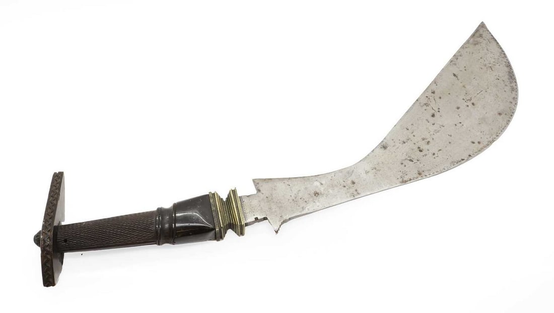 A koorg knife,: A koorg knife, early 19th century, blade 39cm long 56cm long total Shipping Disclaimer Buyers must be aware of their country’s shipping and import policies regarding guns, knives, swords, and ot