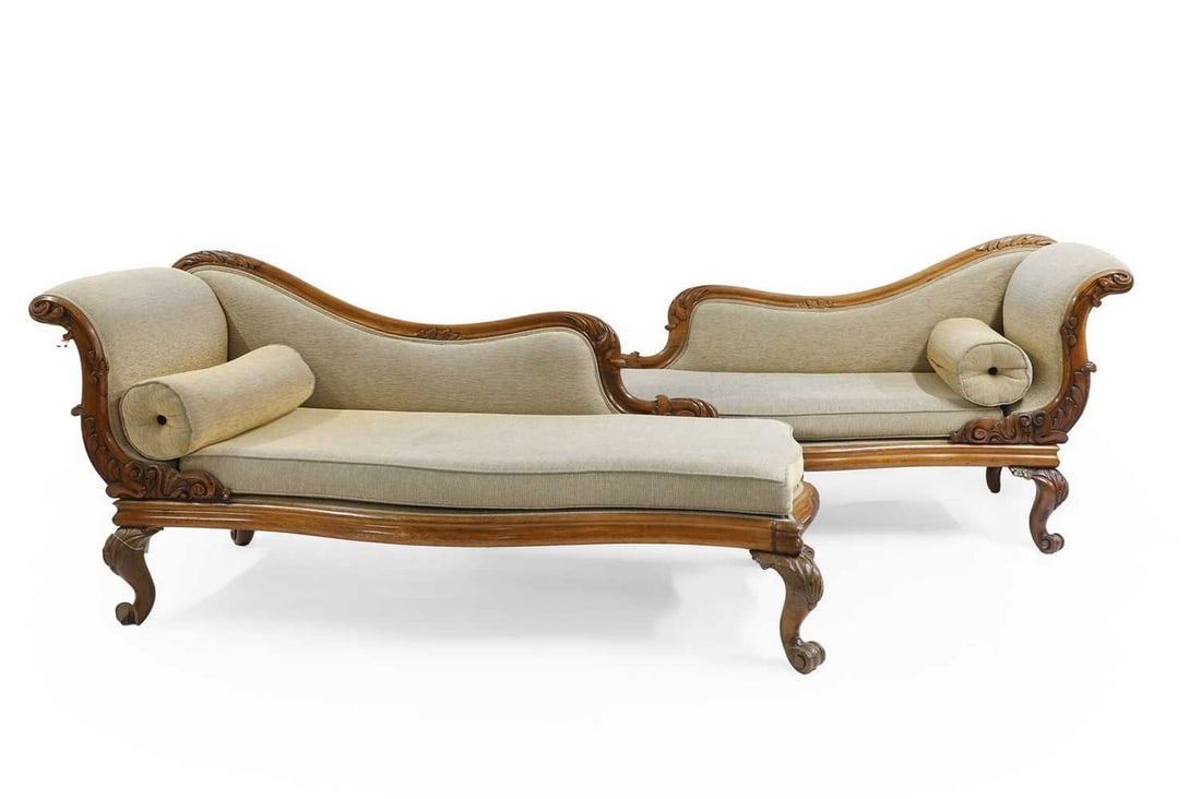 A pair of Victorian mahognay chaise longues,: A pair of Victorian mahognay chaise longues, each with scroll ends, with single bolsters, 180cm wide 72cm deep 84cm high, seat 45cm approx (2) Condition Report: No castors, some losses to the feet and