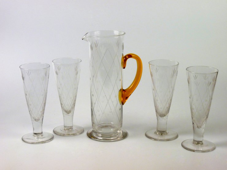 A Stevens & Williams Brierley Cordial Jug and four: A Stevens & Williams Brierley Cordial Jug and four Glasses, designed by Keith Murray, acid etched mark, jug 27.5cm glasses 20cm (5)