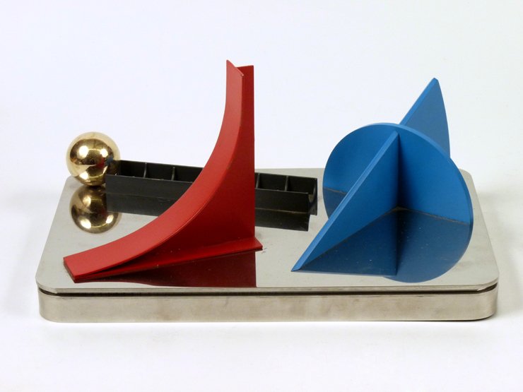 In the style of Lucio del Pezzo, UNTITLED A steel: In the style of Lucio del Pezzo, UNTITLED A steel chrome and painted sculpture 30cm wide