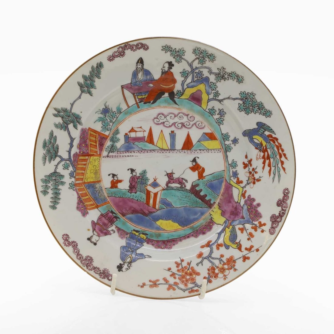 A Chinese porcelain plate: A Chinese porcelain plate c.1725, Dutch decorated with Chinoiserie figures and a goat in a landscape based upon a Meissen original, 22cm diameter Provenance: The David and Sarah Battie Collection. Con