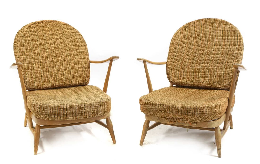 A pair of beech Ercol 'Windsor' chairs: A pair of beech Ercol 'Windsor' chairs designed by Lucian Ercolani, model 203, with squab cushions backs and seats, 72cm wide 69cm deep 78cm high(2)
