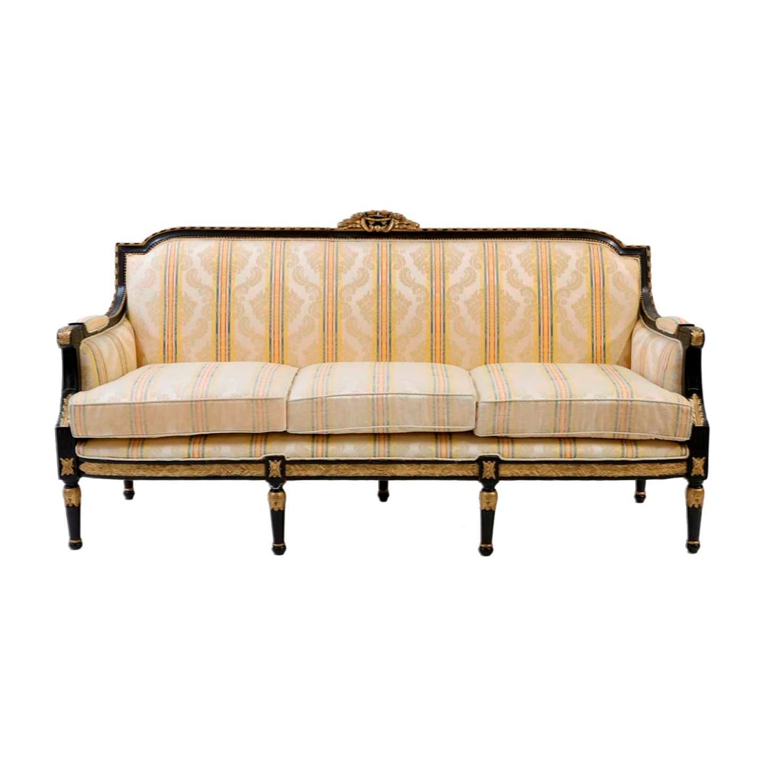 A pair of Louis XVI design ebonised and parcel gilt settees: A pair of Louis XVI design ebonised and parcel gilt settees with pad backs above stuffover seats, on fluted turned supports, 180cm wide 65cm deep 115cm high (2)