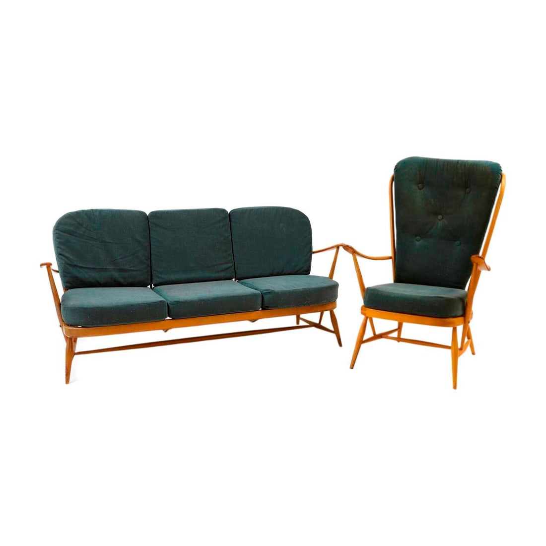 An Ercol beech and elm Windsor three-seater settee and a matched armchair: An Ercol beech and elm Windsor three-seater settee and a matched armchair c.1950, each with a spindle back, labelled, settee 173cm wide 75cm deep 79cm high, seat 27.5cm high armchair 73cm wide 88cm de