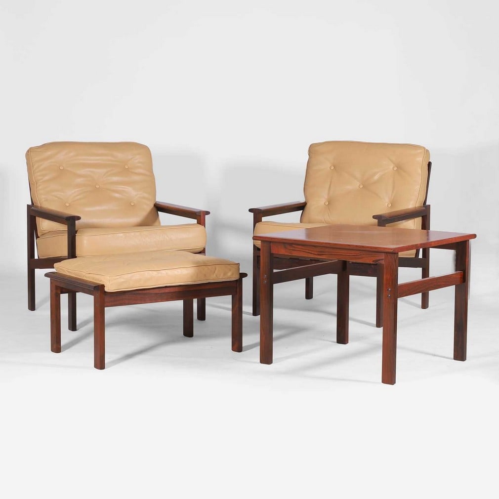 Illum Wikkelsø (Danish, 1919-1999) for Niels Eilersen,: Illum Wikkelsø (Danish, 1919-1999) for Niels Eilersen, a pair of ziricote armchairs, 1960s, each with leather upholstery, 68cm wide 68cm deep 68cm high, seat 40cm high, together with an accompany
