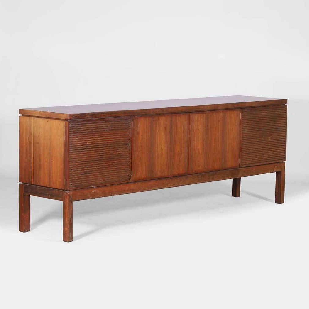 § Robert Heritage (1927-2008) for Archie Shine,: § Robert Heritage (1927-2008) for Archie Shine, a 'Bridgeford' rosewood sideboard, 1970s, with a pair of central cabinet doors, each opening to shelving, flanked to either side by lattice-front c