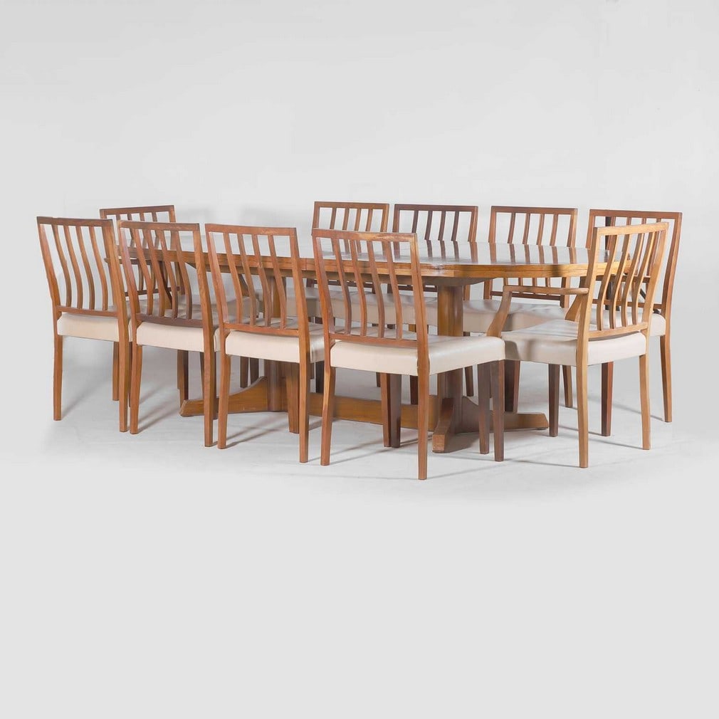 § Robert Heritage (1927-2008) for Archie Shine,: § Robert Heritage (1927-2008) for Archie Shine, a rosewood dining suite, 1970s, comprising: an extending dining table, fully extended 246cm wide 110cm deep 71cm high, eight dining chairs, 49cm wi