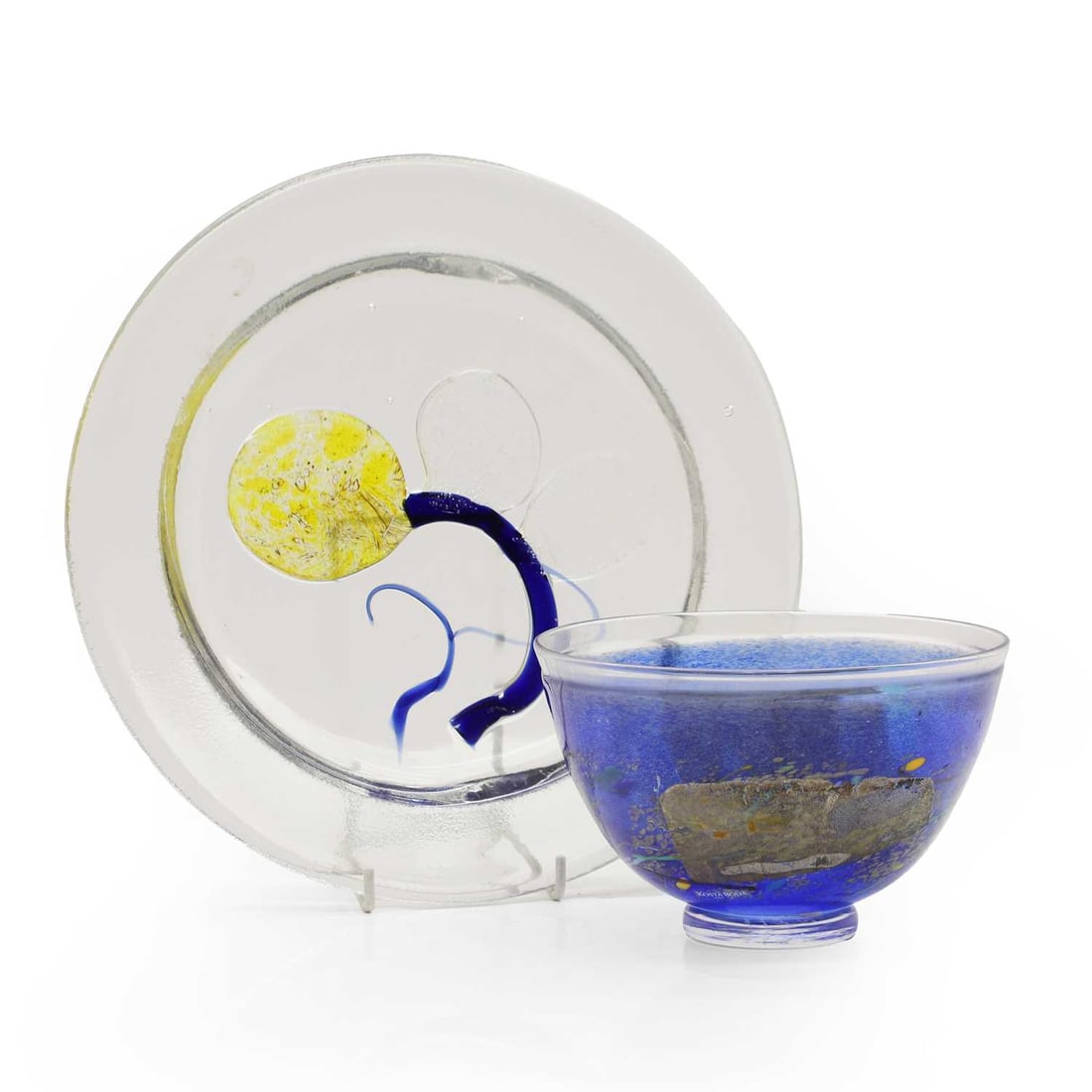 A Kosta Boda glass 'Satellite' bowl: A Kosta Boda glass 'Satellite' bowl of recent manufacture designed by Bertil Vallien, engraved 'B. Vallien, 59251' 16.5cm diameter and Nuutajärvi glass plate, of recent manufacture, designed by O