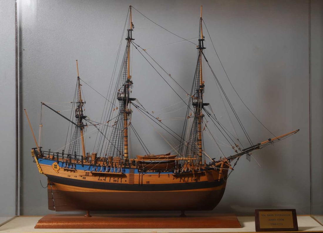 A scratch built model of HM Bark Endeavour: A scratch built model of HM Bark Endeavour James Cook's sailing ship 1768-1771 within a glazed display case case size 88cm wide 39cm deep 76cm high Condition Report: minor surface scratches to case, e