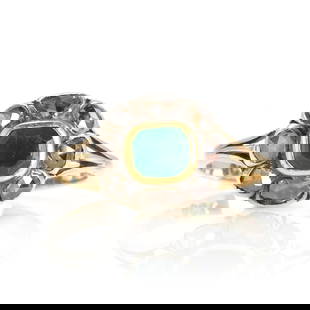A Georgian emerald and rose cut diamond cluster ring,: A Georgian emerald and rose cut diamond cluster ring, with a rectangular step cut emerald, encircled by a surround of rose cut diamonds, in a silver and gold foiled back setting, to trifurcated should