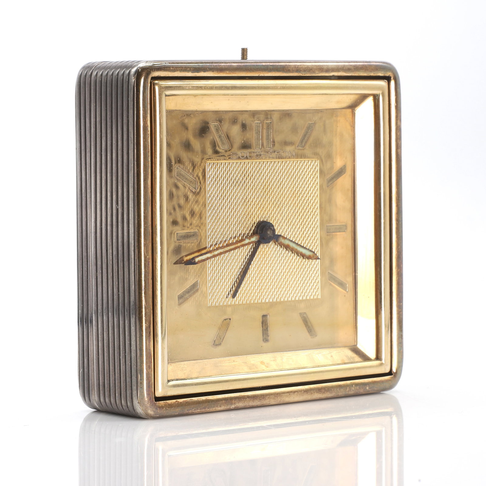 A sterling silver and gold travel alarm clock, by Boucheron, (1 of 3)