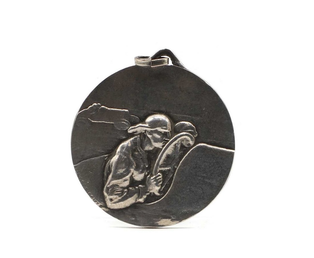 A silver Venice automobile club medal,: A silver Venice automobile club medal, double-sided, showing two automobiles with drivers, the reverse reading 'Automobile Club Veneto, Coppa delle Tre Venezie, Padova 1-3 Giugno 1923', 3.8cm diameter