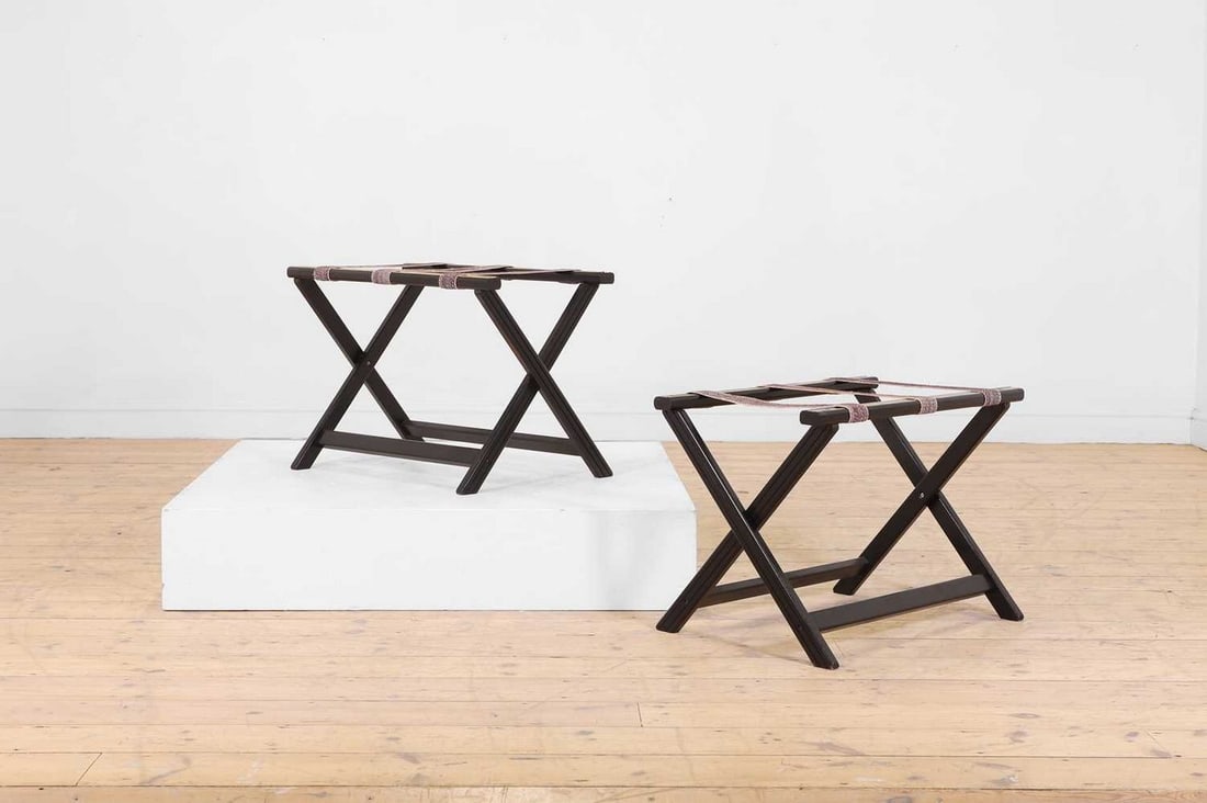A pair of ebonised wooden luggage stands, (1 of 5)