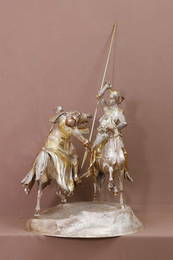 A large Victorian silver-gilt figural trophy,