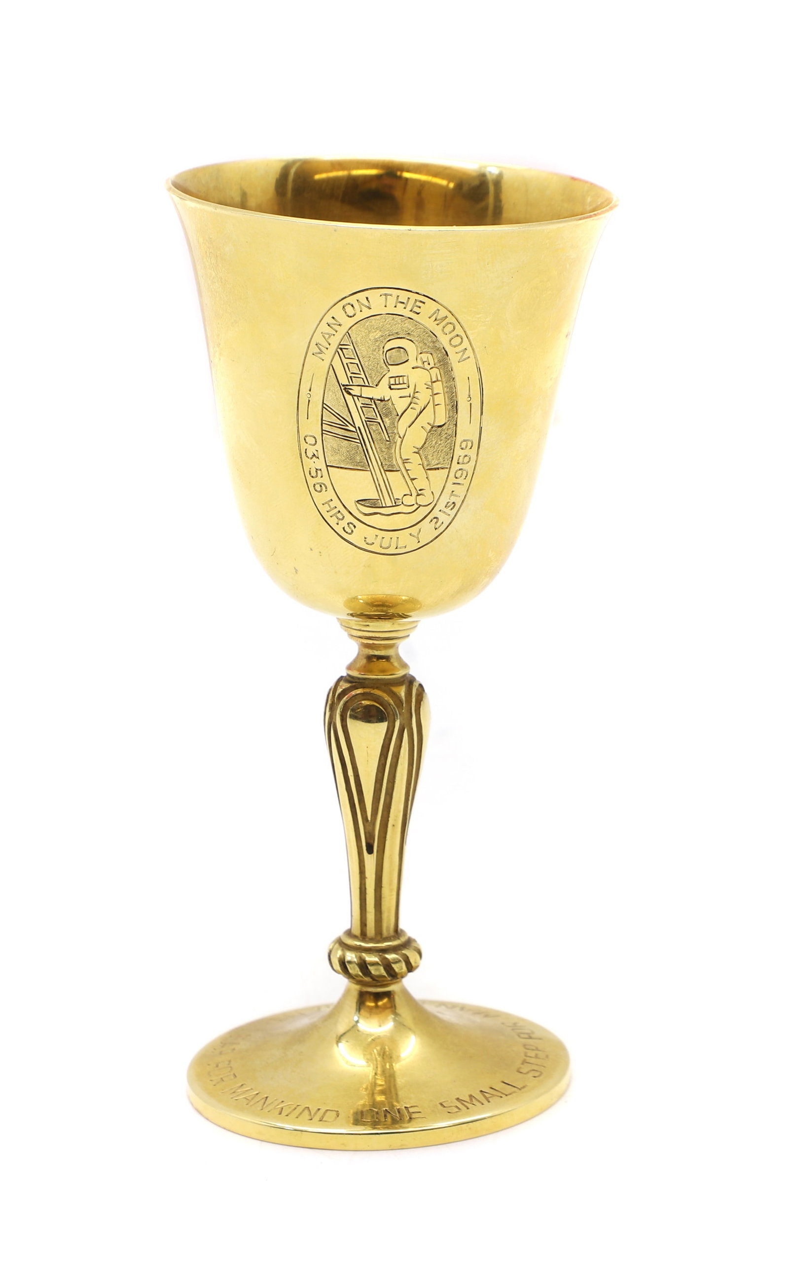 A 1969 Elizabeth II 18ct gold 'The Landing of the First Man on the Moon' commemorative goblet,: A 1969 Elizabeth II 18ct gold 'The Landing of the First Man on the Moon' commemorative goblet, by A.E. Jones Ltd, Birmingham 1969, No.180/500, the bell-shaped bowl engraved with an oval panel engraved