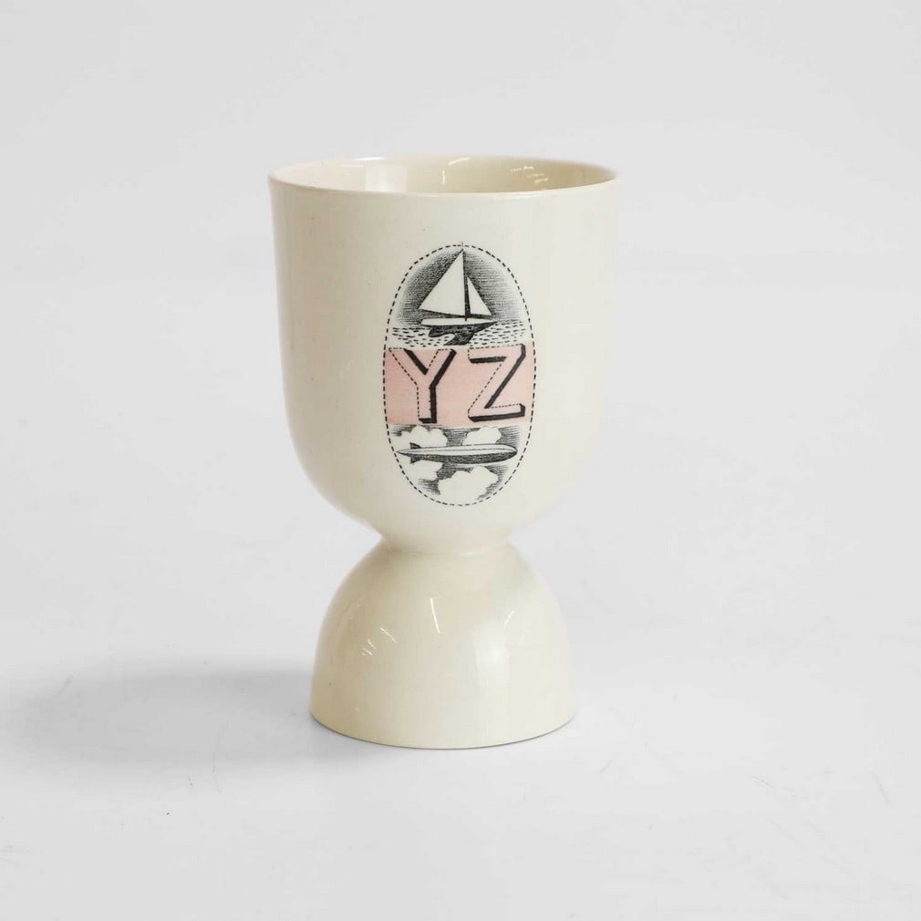 Eric Ravilious (1903-1942) for Wedgwood,: Eric Ravilious (1903-1942) for Wedgwood, a pink 'Alphabet' egg cup, printed marks and painted 'CL 6260 T', 10.4cm high Provenance: From the private collection of Barry and Saria Viney, London, who wer