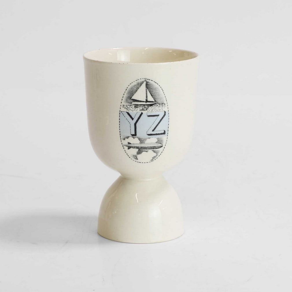 Eric Ravilious (1903-1942) for Wedgwood,: Eric Ravilious (1903-1942) for Wedgwood, a blue 'Alphabet' egg cup, printed marks and painted 'AL 6261 T', 10.4cm high Provenance: From the private collection of Barry and Saria Viney, London, who wer