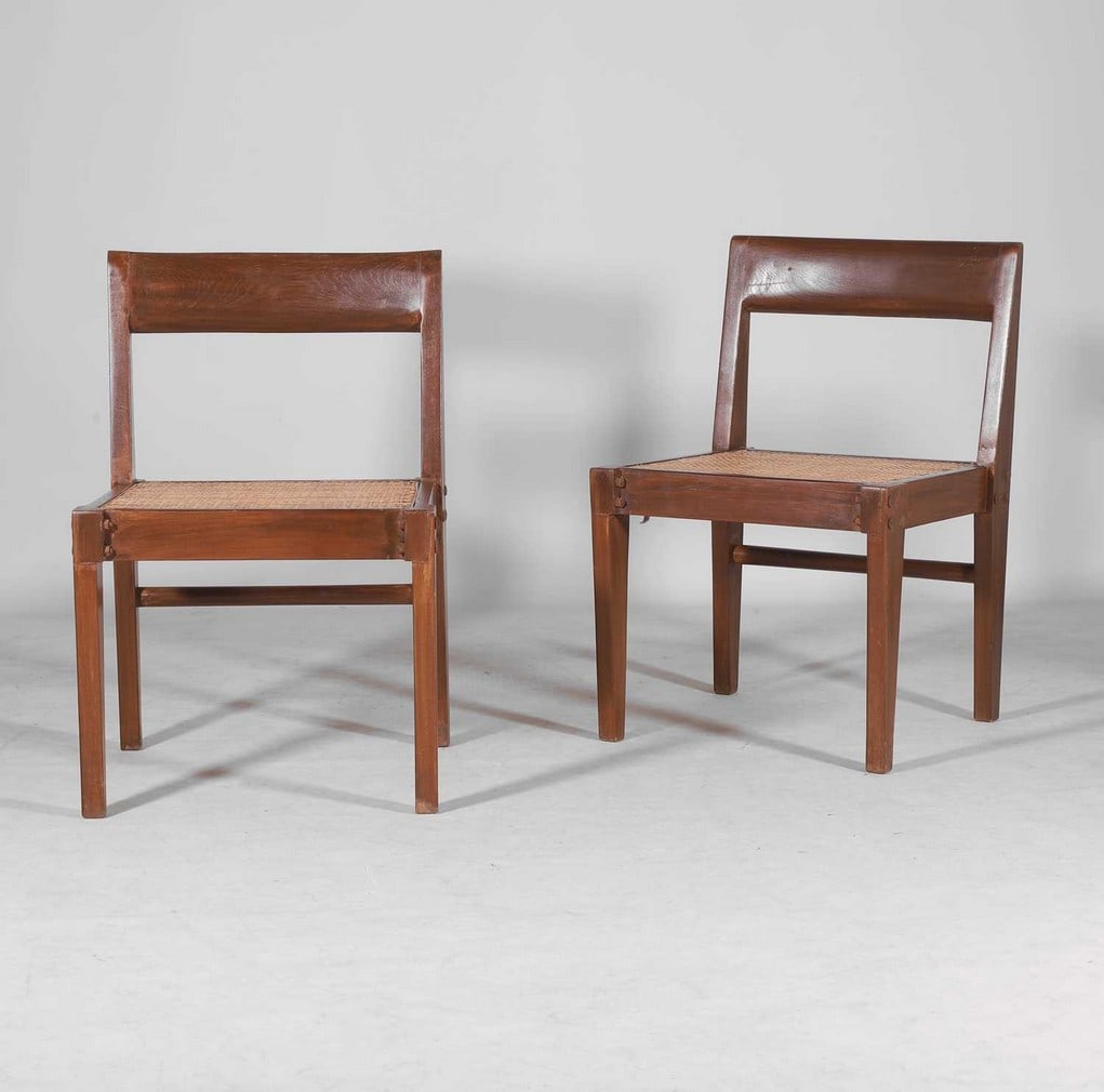 Pierre Jeanneret (Swiss, 1896-1967),: Pierre Jeanneret (Swiss, 1896-1967), a pair of 'PJ-010514' demountable chairs, also known as 'Chaise en Teck', c.1955, designed for Chandigarh, each of teak, with a single band back support and caned