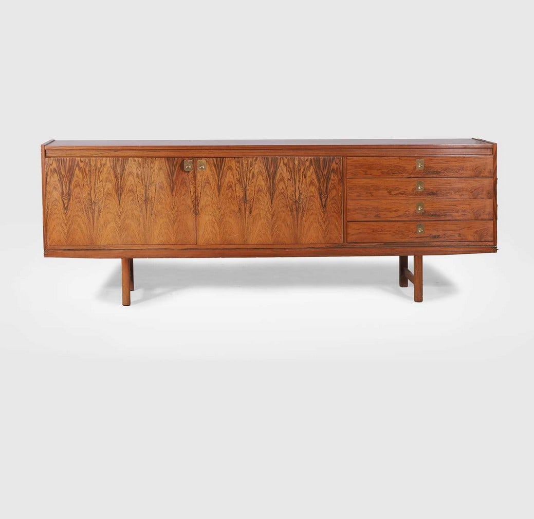 § Robert Heritage (1927-2008) for Archie Shine,: § Robert Heritage (1927-2008) for Archie Shine, a 'Hamilton' rosewood sideboard, c.1960s, to the left, a section with double doors opening to reveal two shelved compartments, to the right, a bank