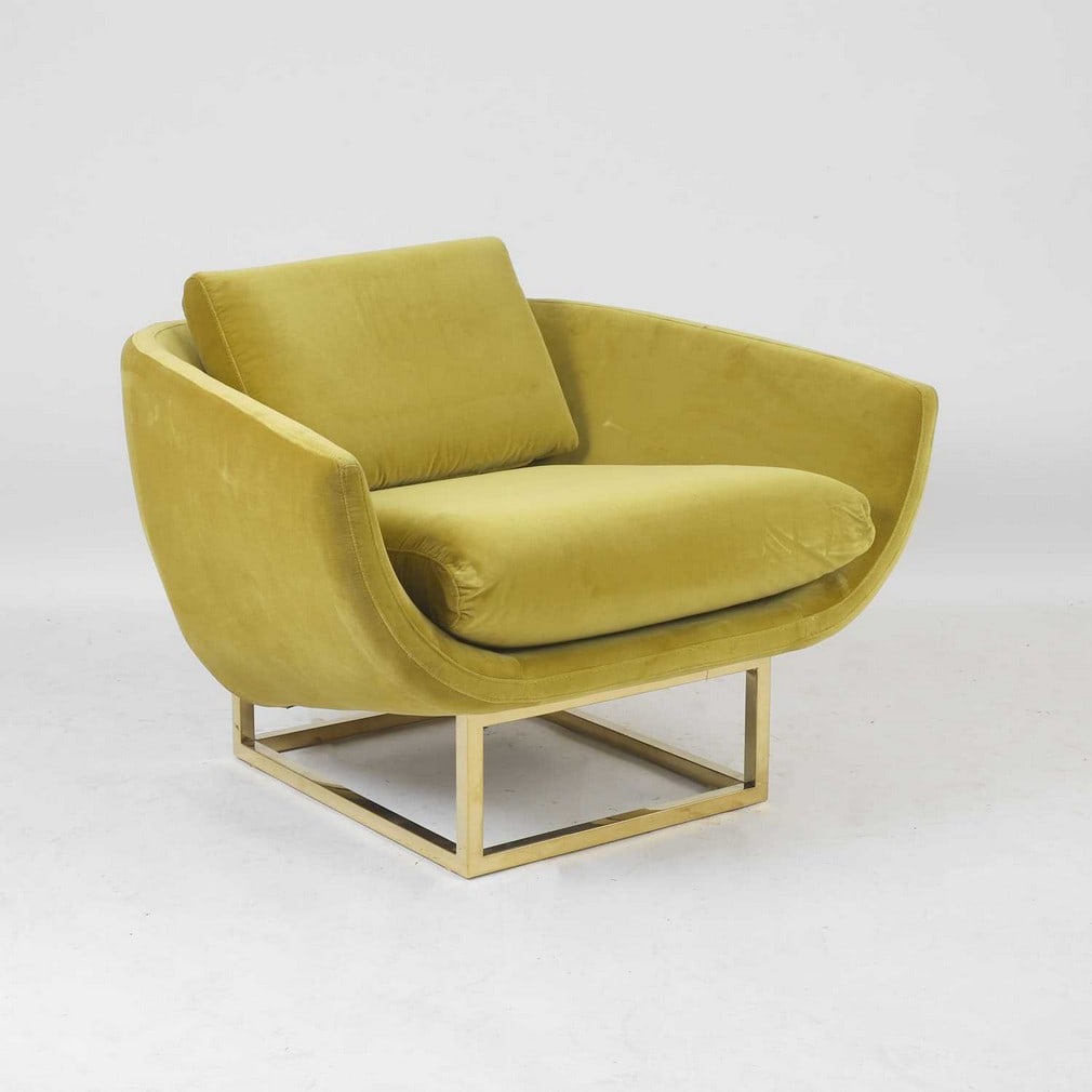 Jonathan Adler (American, b.1966),: Jonathan Adler (American, b.1966), a 'Beaumont' armchair, of recent manufacture, upholstered in mustard yellow velvet, over a polished brass square frame, with embossed plaque 'Jonathan Adler' to the