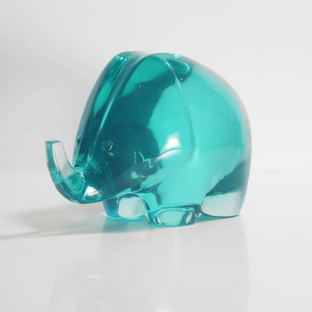 Jonathan Adler (American, b.1966),: Jonathan Adler (American, b.1966), a turquoise Lucite elephant, contemporary, labelled twice, 28cm wide 18cm high Condition Report: Good overall.