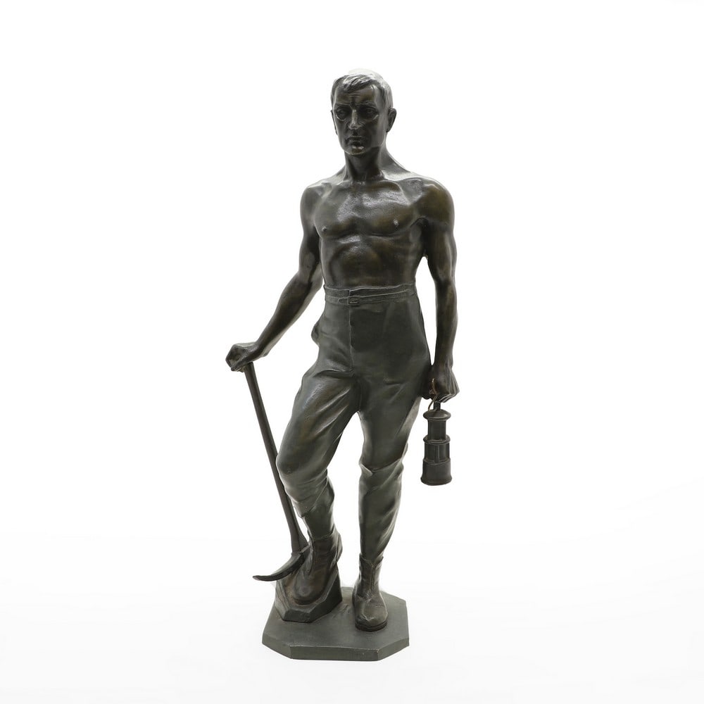 After Franz Iffland (1862-1935),: After Franz Iffland (1862-1935), a bronze of a miner with a pickaxe, signed and cast 'Kraas Bildgiessere', 57cm high