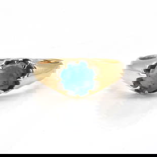 An Edwardian 18ct gold turquoise set ring,: An Edwardian 18ct gold turquoise set ring, the round cabochon turquoise belcher set to a tapering hoop, Chester hallmark, indistinct date letter, probably 1904, 6.65g Ring size T Buying this gemstone